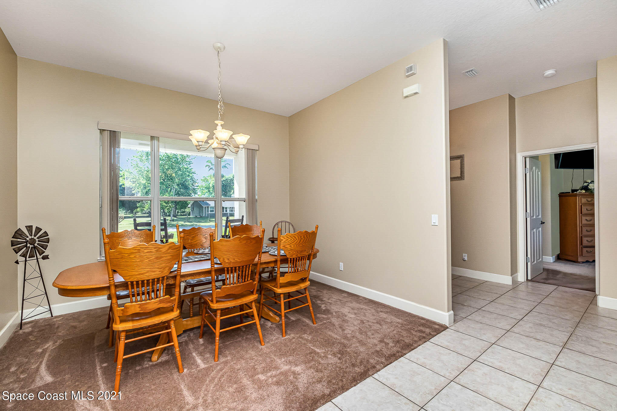 4329 Hunter Road Mims, FL 32754 - Photo 5 of 35 a dining room with furniture and window