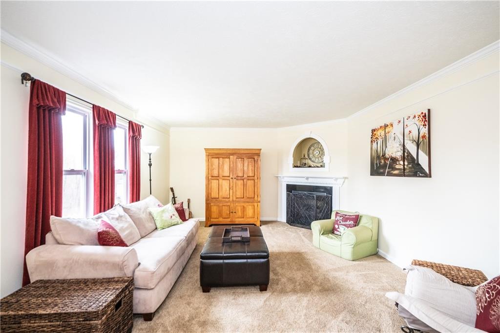 518 Blue Ridge Drive Coraopolis, PA 15108 - Photo 2 of 25 Welcoming Family room with plenty of natural light, adjacent to kitchen with gas fireplace.