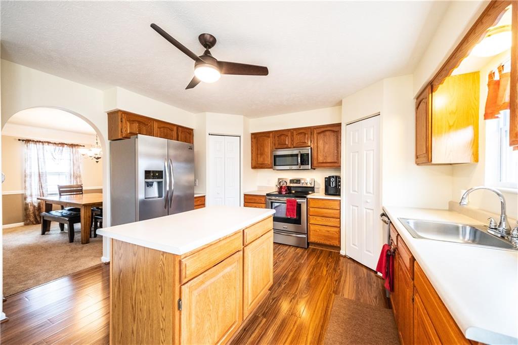 518 Blue Ridge Drive Coraopolis, PA 15108 - Photo 4 of 25 Eat-in Kitchen with fully equipped, newer stainless steel appliances, island and pantry.