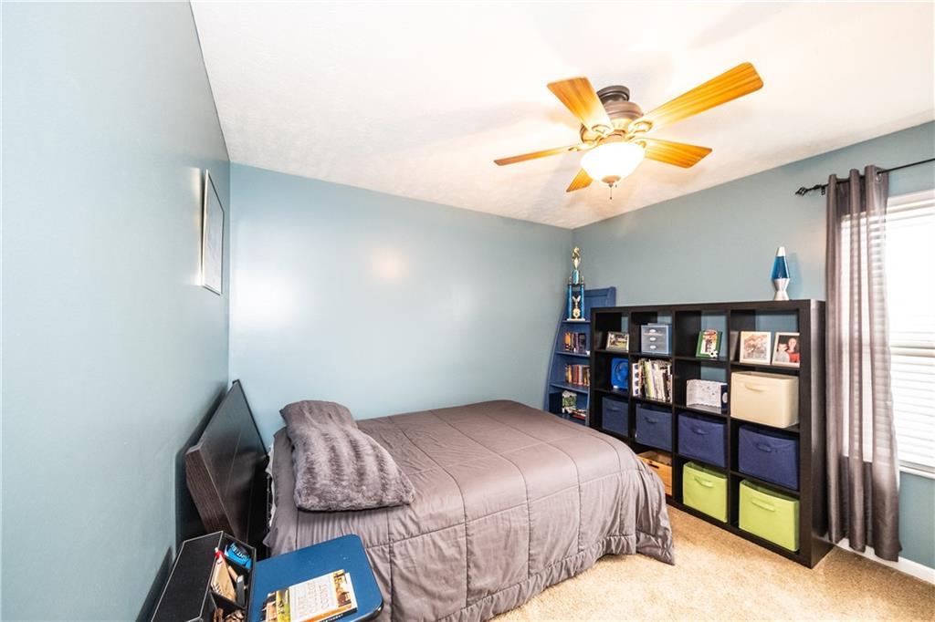 518 Blue Ridge Drive Coraopolis, PA 15108 - Photo 10 of 25 Upper bedroom with closet and ceiling fan.