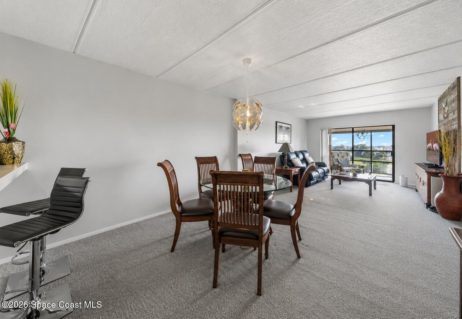 2775 North Wickham Road, Unit A403 Melbourne, FL 32935 - Photo 8 of 24 Dining space