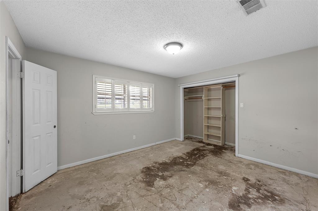 849 Deer Ridge Drive Woodway, TX 76712 - Photo 11 of 25 a view of an empty room with a window