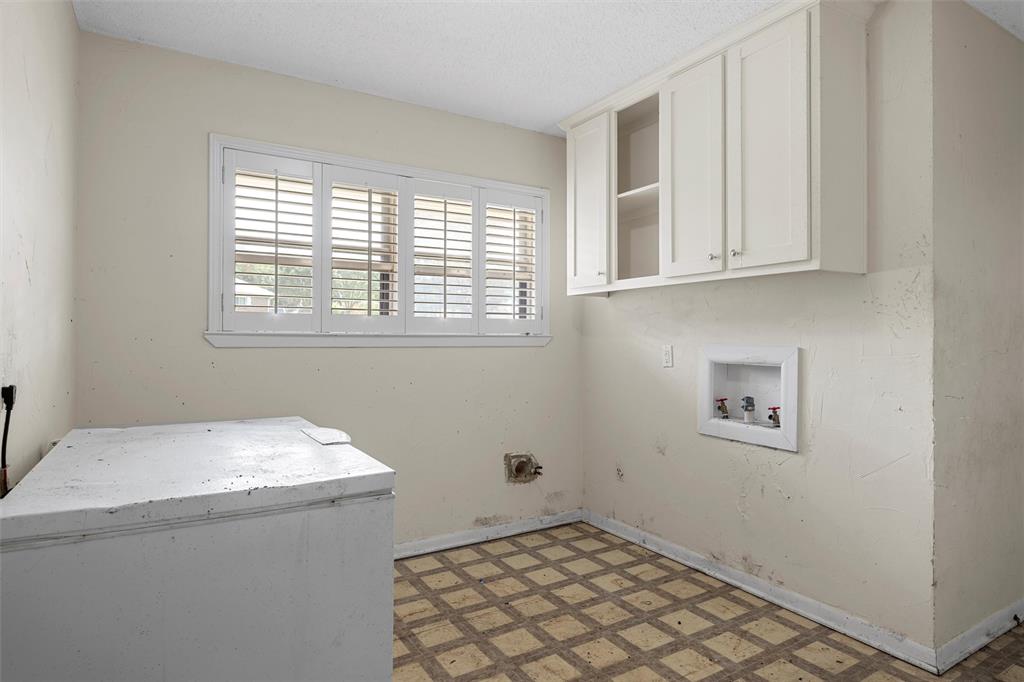 849 Deer Ridge Drive Woodway, TX 76712 - Photo 20 of 25 a room with cabinet and window