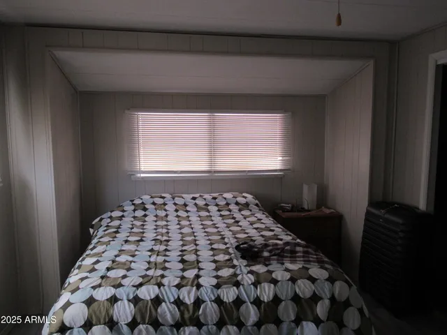 a bathroom with a shower and a window