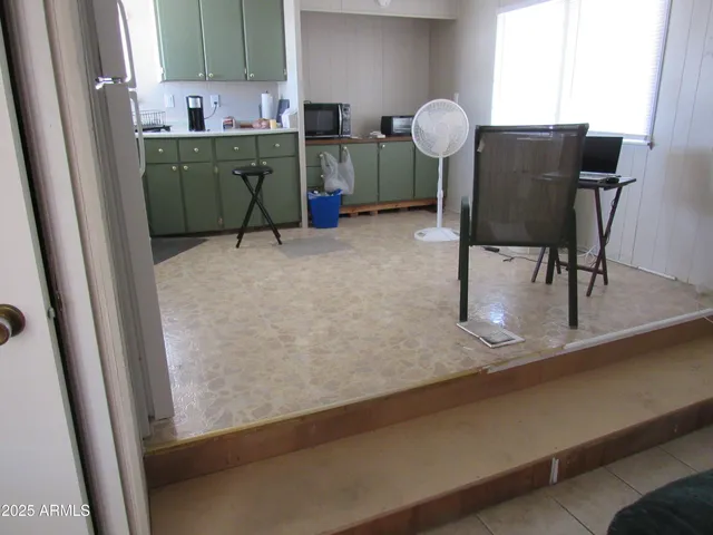 a room with cabinets and furniture