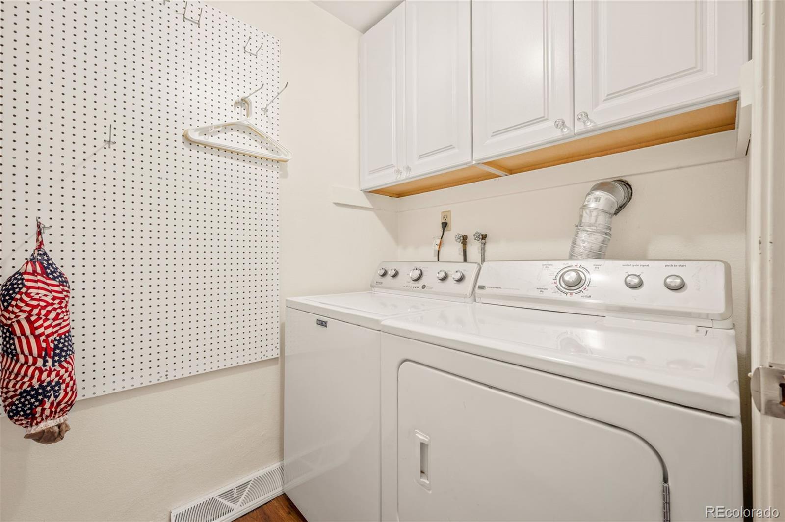 8734 Independence Way Arvada, CO 80005 - Photo 15 of 50 a utility room with dryer and washer