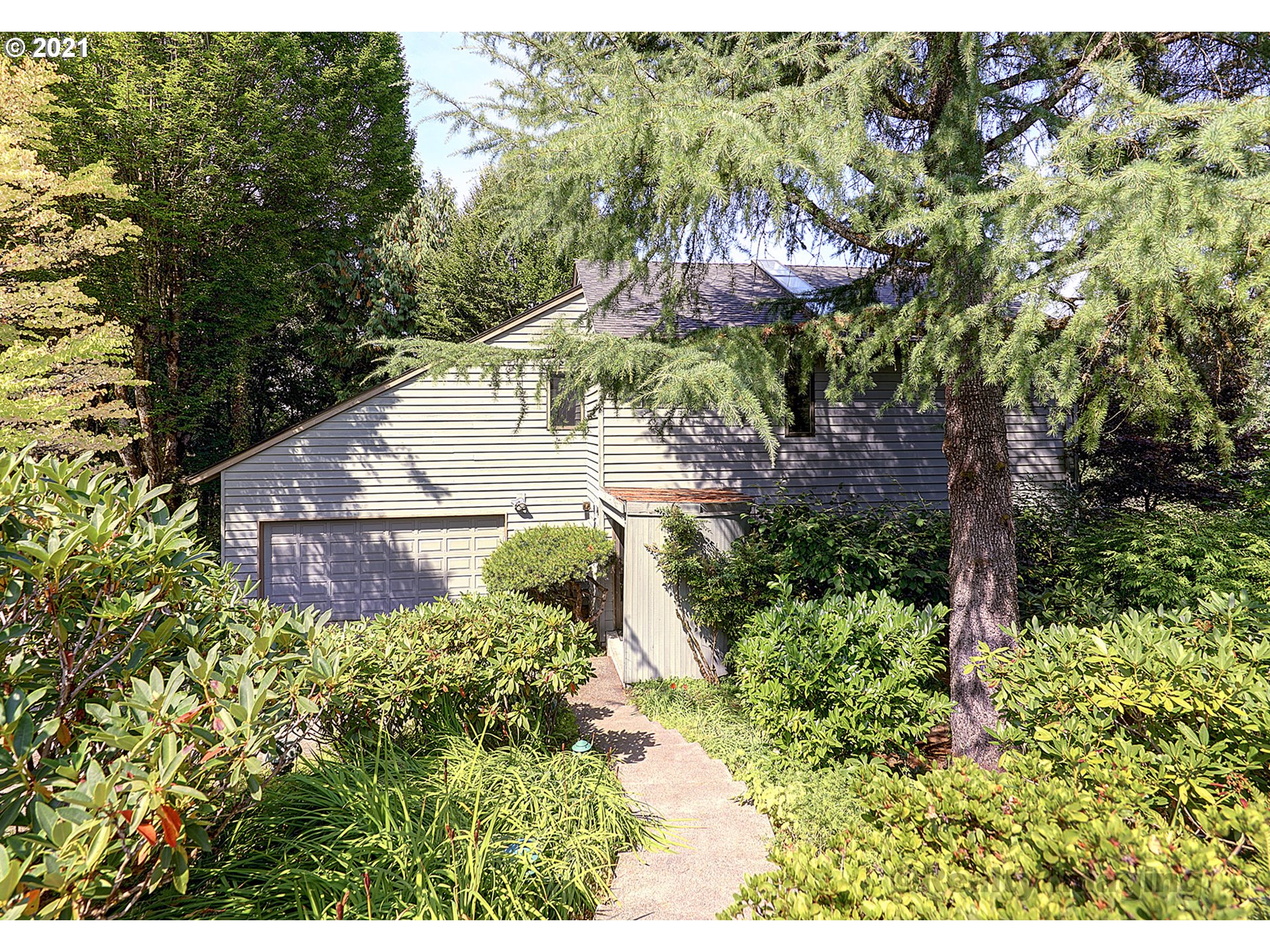 7402 Northwest Penridge Road Portland, OR 97229 - Photo 2 of 32 a view of a back yard