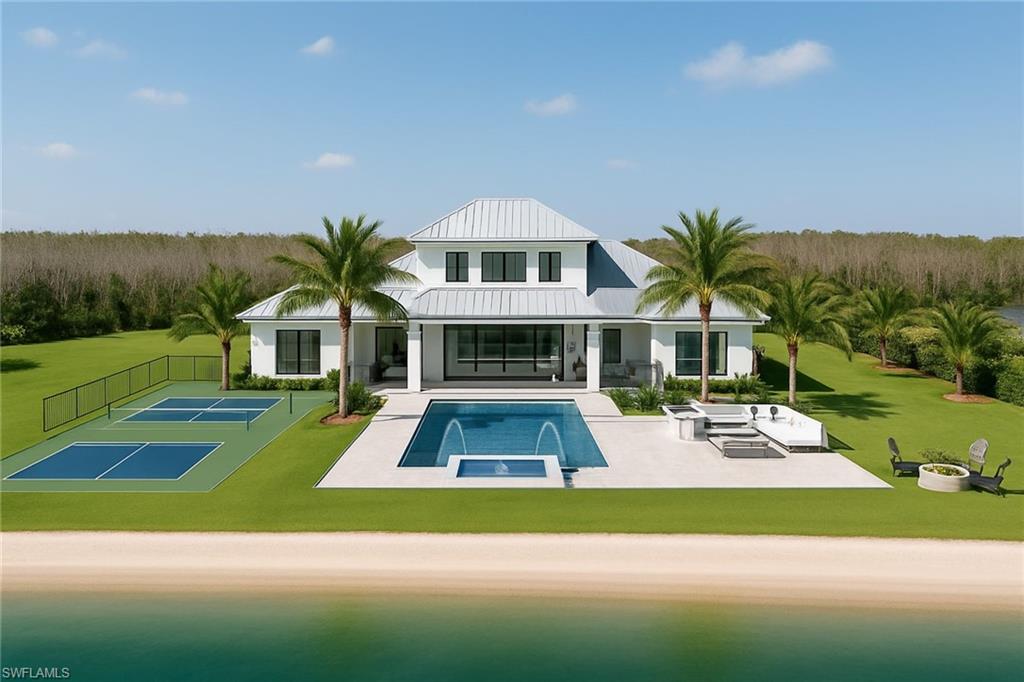 20200 Slalom Course Court Estero, FL 33928 - Photo 2 of 20 a front view of house with yard and green space