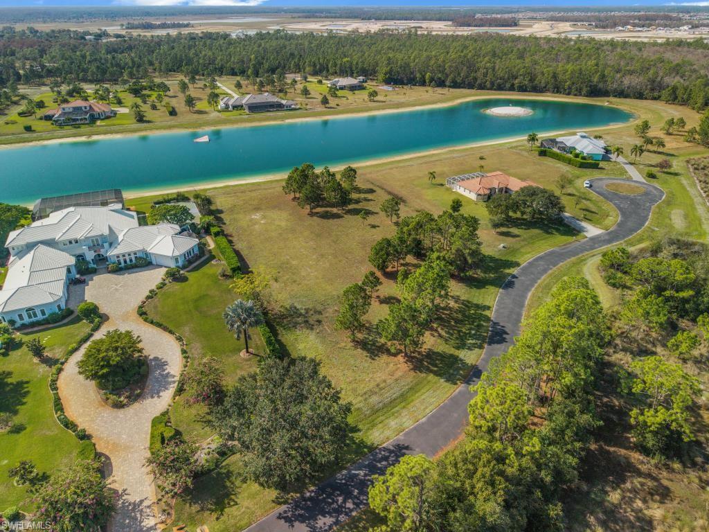 20200 Slalom Course Court Estero, FL 33928 - Photo 8 of 20 an aerial view of a city with lake view