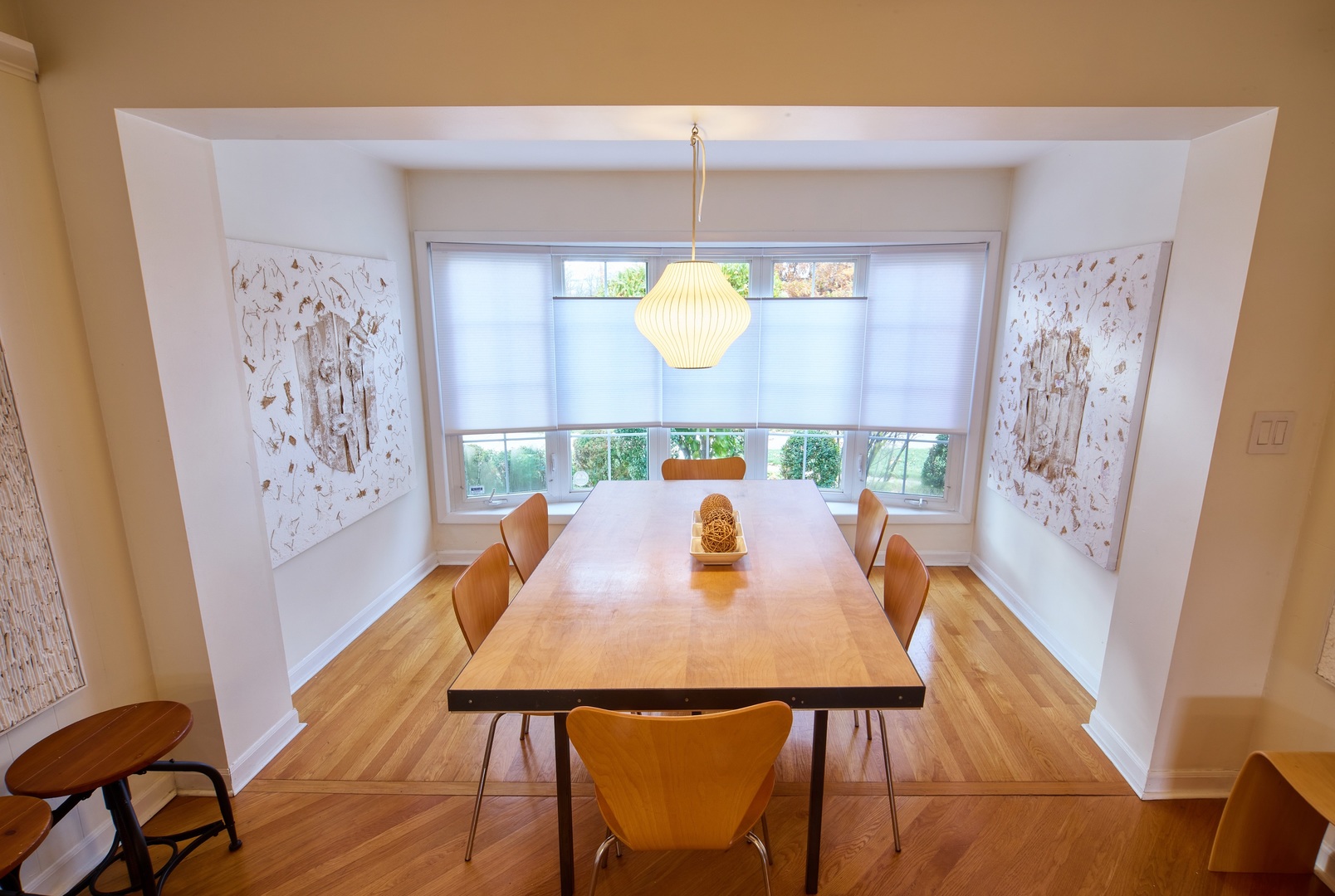 5955 North Keating Avenue Chicago, IL 60646 - Photo 9 of 22 a view of a dining room with furniture and a window