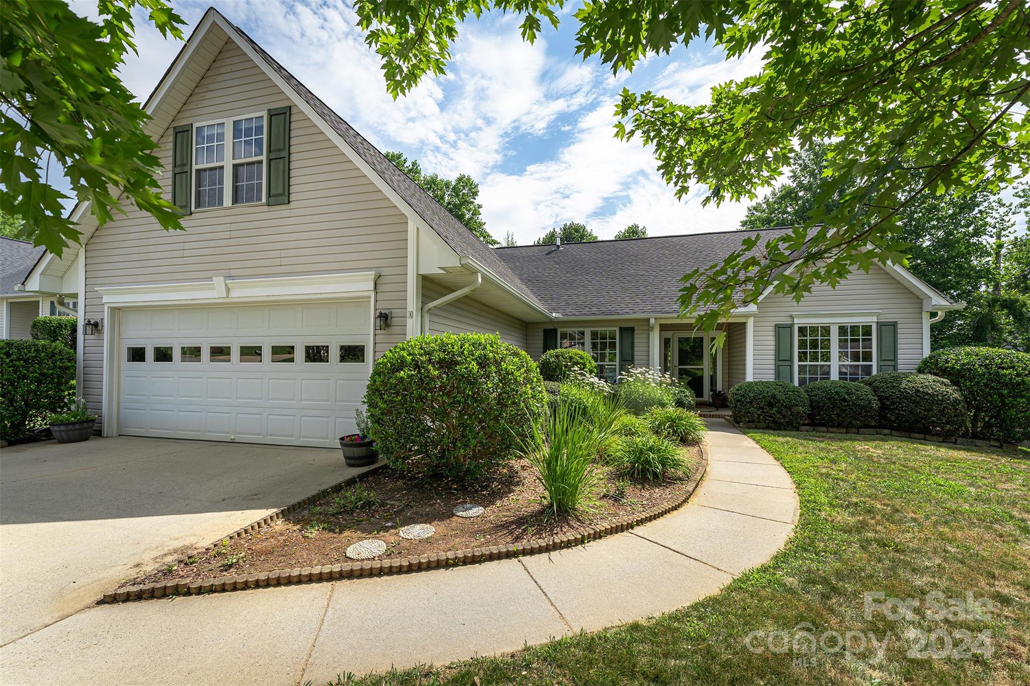 311 Planters Creek Road Fletcher, NC 28732 - Photo 1 of 24 a view of a house with a yard potted plants