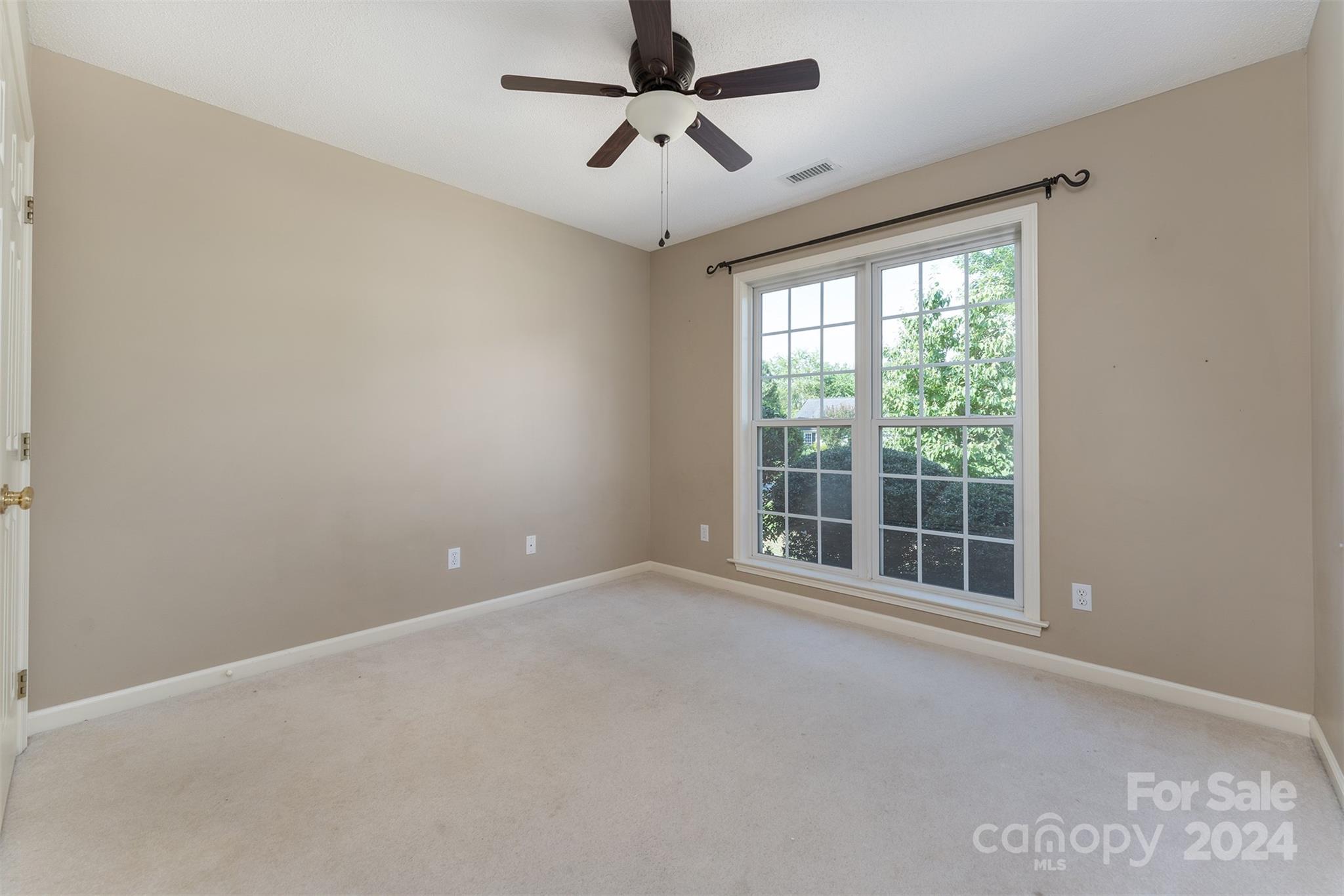 311 Planters Creek Road Fletcher, NC 28732 - Photo 15 of 24 a view of an empty room with a window