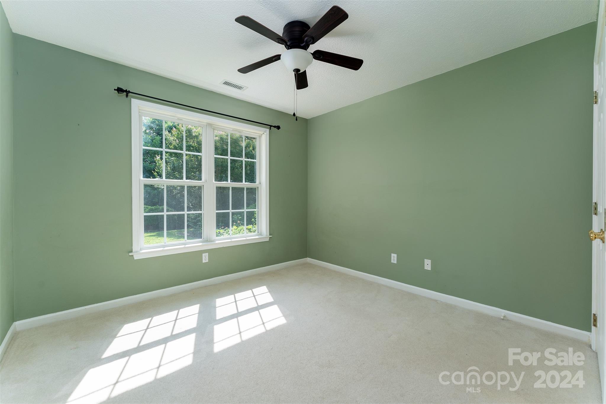 311 Planters Creek Road Fletcher, NC 28732 - Photo 17 of 24 a view of an empty room with a window