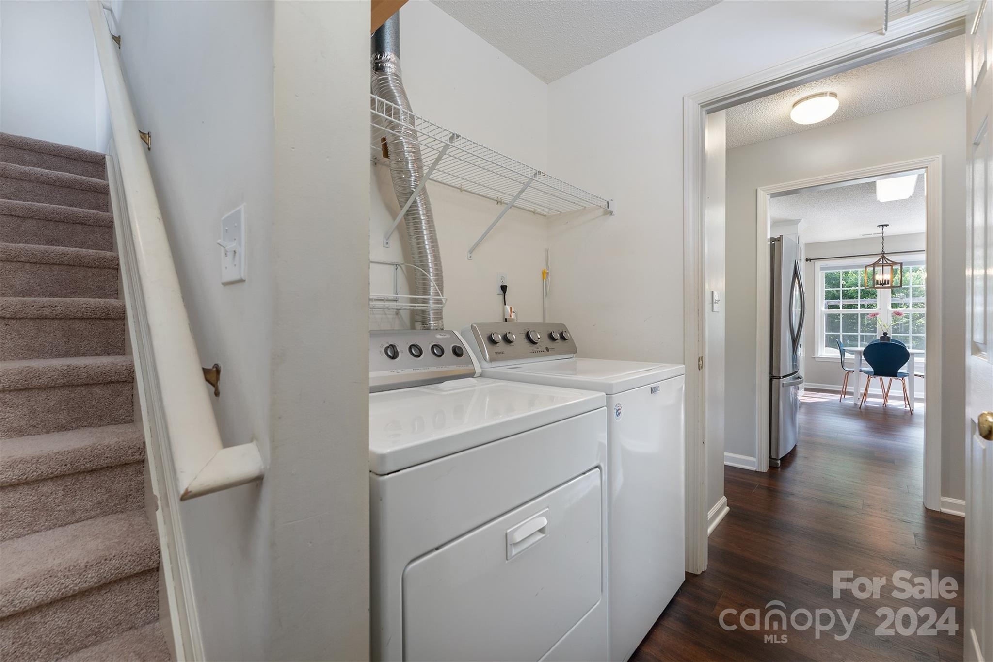 311 Planters Creek Road Fletcher, NC 28732 - Photo 18 of 24 a view of hallway with washer and dryer