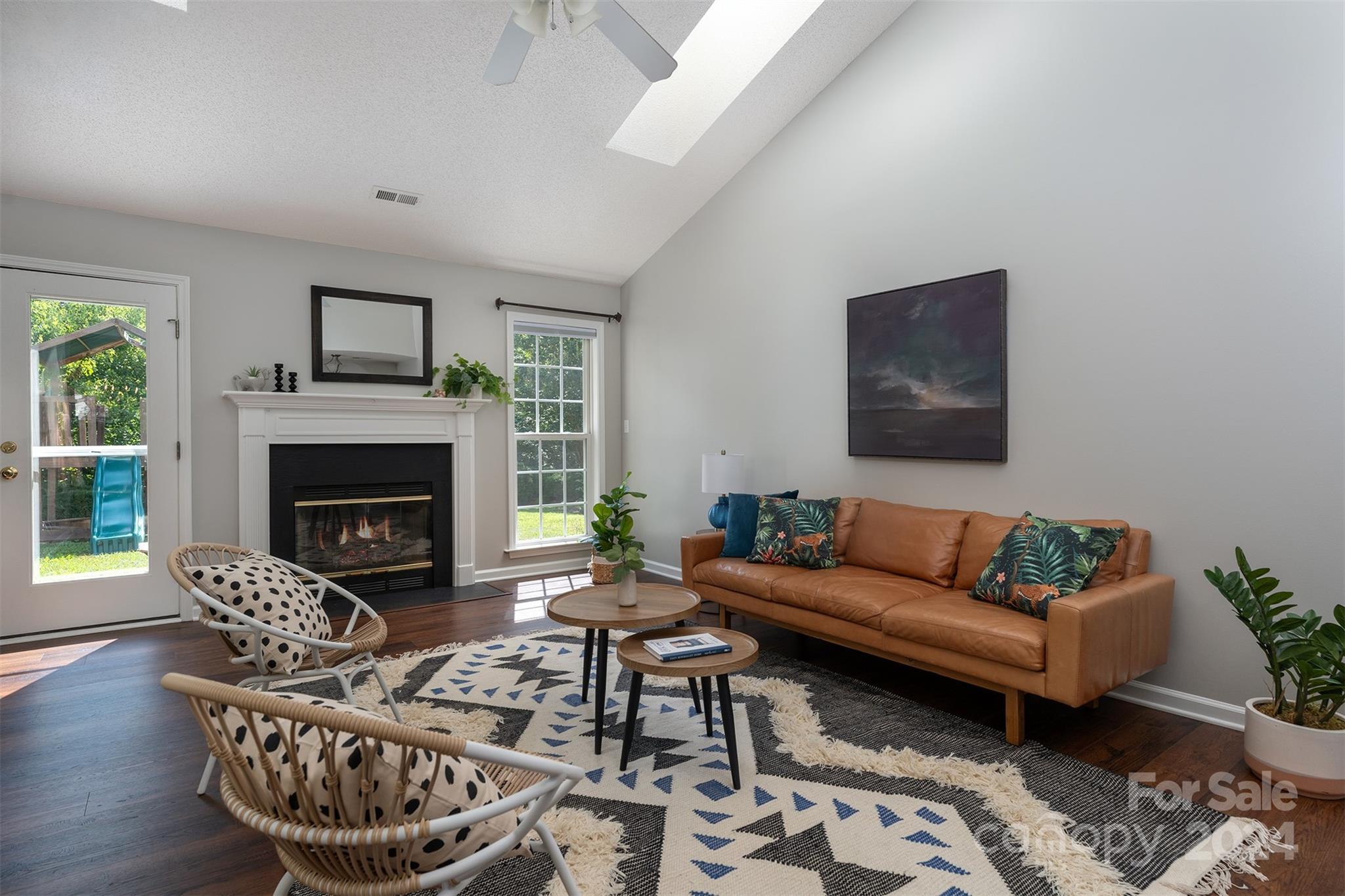 311 Planters Creek Road Fletcher, NC 28732 - Photo 6 of 24 a living room with furniture and a fireplace