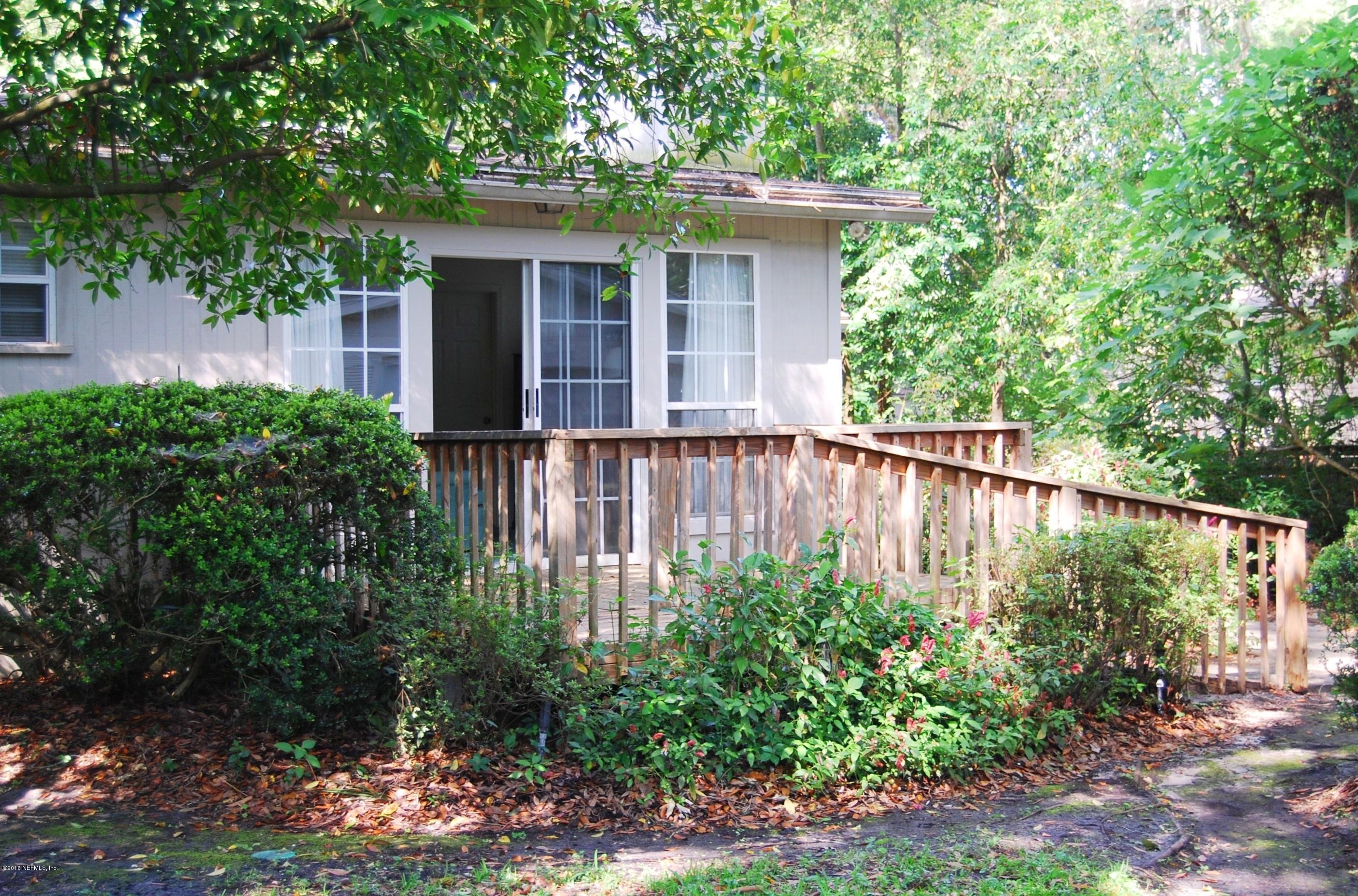 4411 Milstead Road Jacksonville, FL 32210 - Photo 27 of 31 a view of a house with a yard