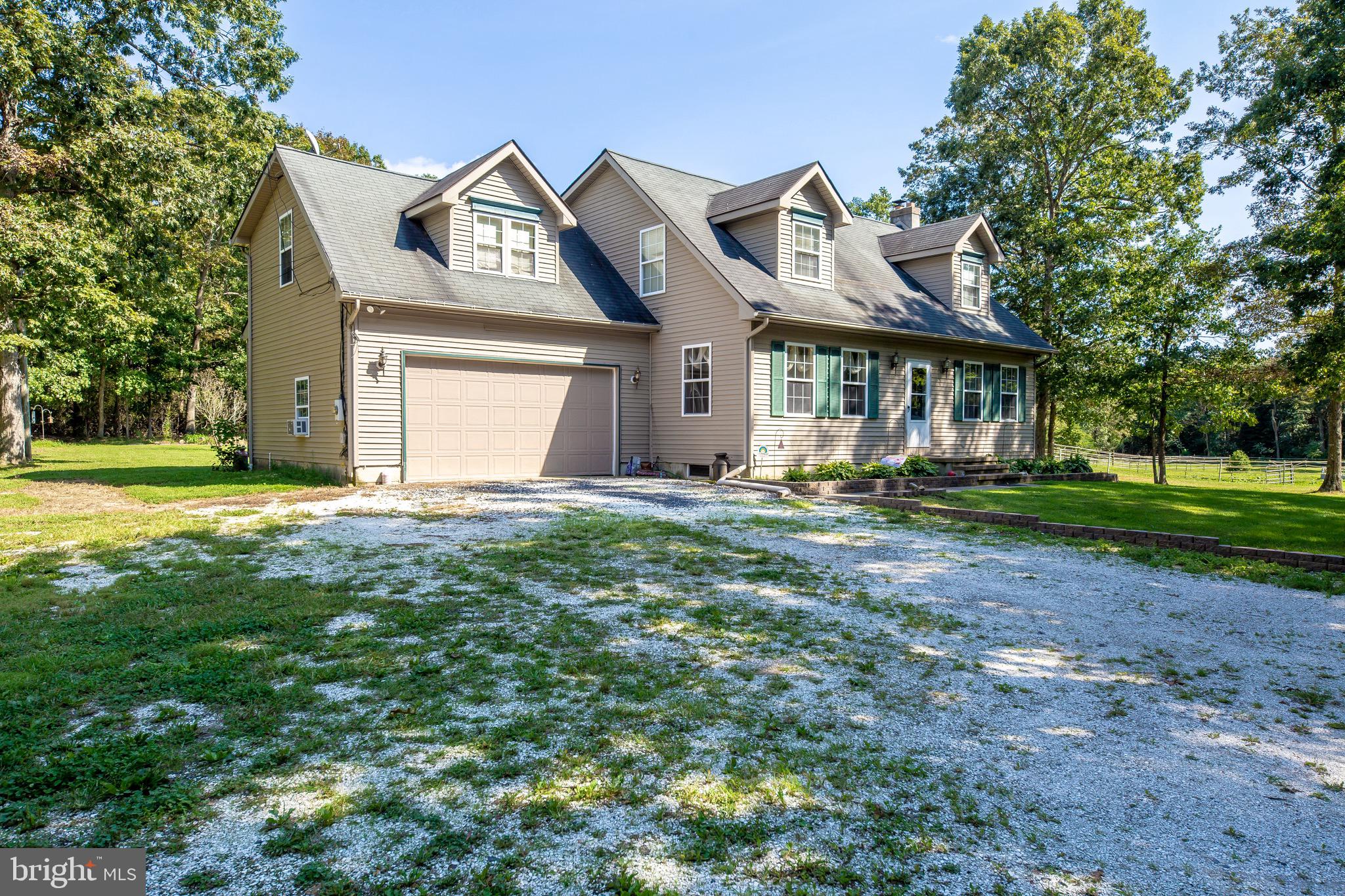 300 Ramah Road Bridgeton, NJ 08302 - Photo 2 of 41 a front view of a house with a yard