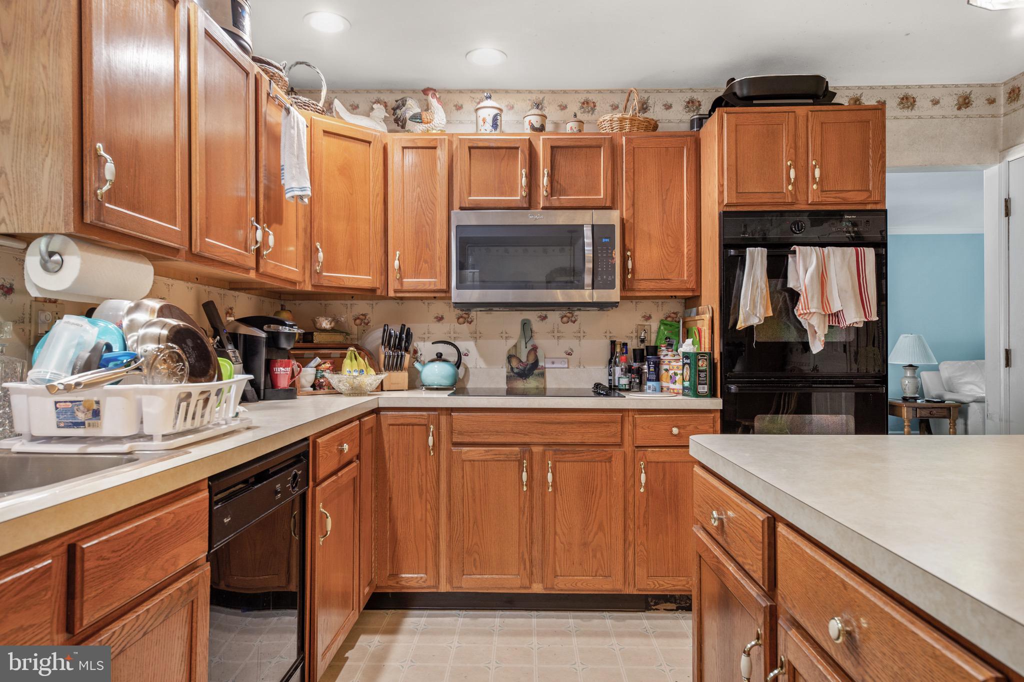 300 Ramah Road Bridgeton, NJ 08302 - Photo 11 of 41 a kitchen with stainless steel appliances granite countertop a sink stove and cabinets