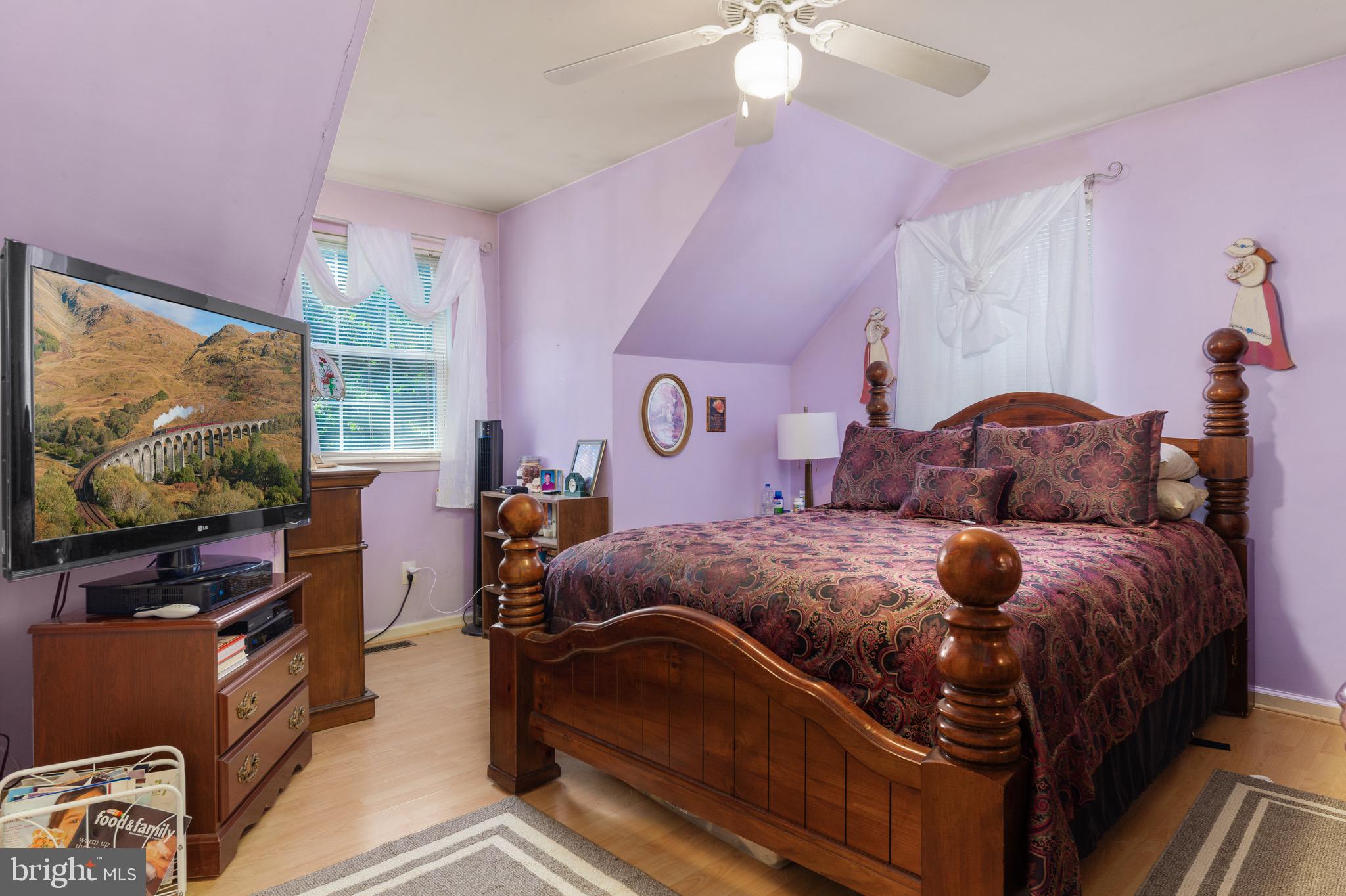 300 Ramah Road Bridgeton, NJ 08302 - Photo 17 of 41 a bedroom with a bed and flat tv screen on the dresser