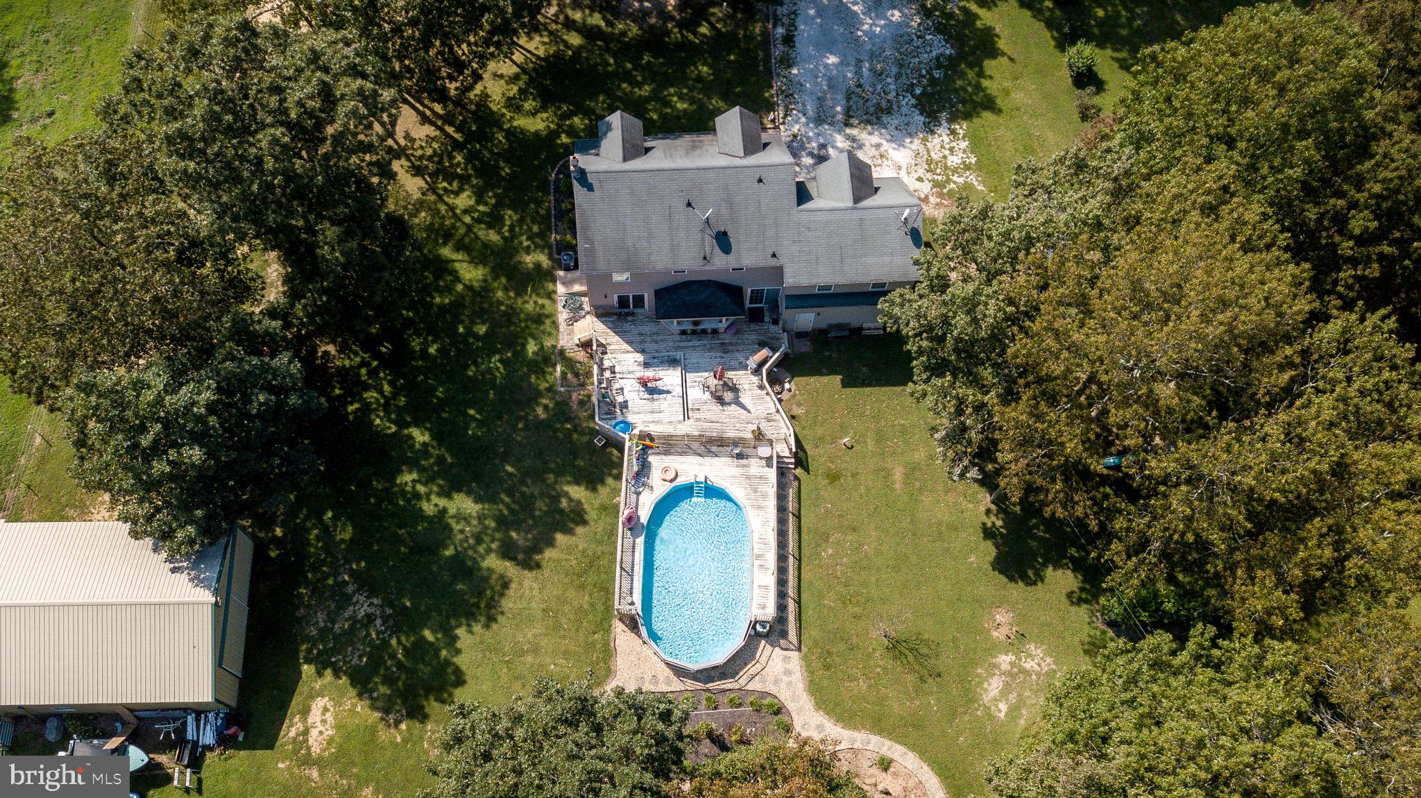 300 Ramah Road Bridgeton, NJ 08302 - Photo 30 of 41 an aerial view of a house with swimming pool and large trees