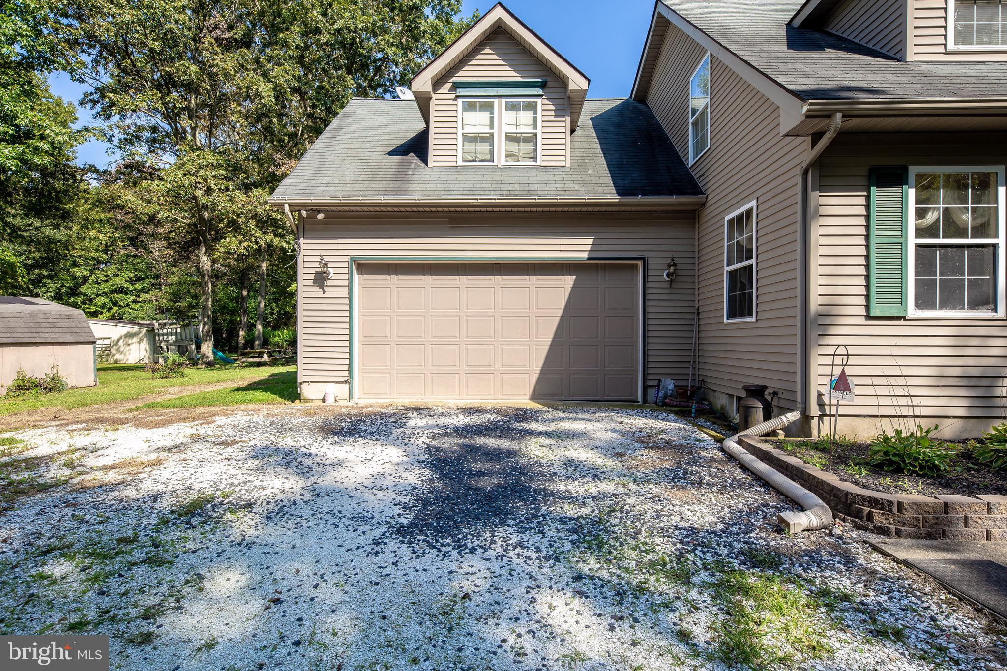 300 Ramah Road Bridgeton, NJ 08302 - Photo 39 of 41 a view of a house with a yard and garage