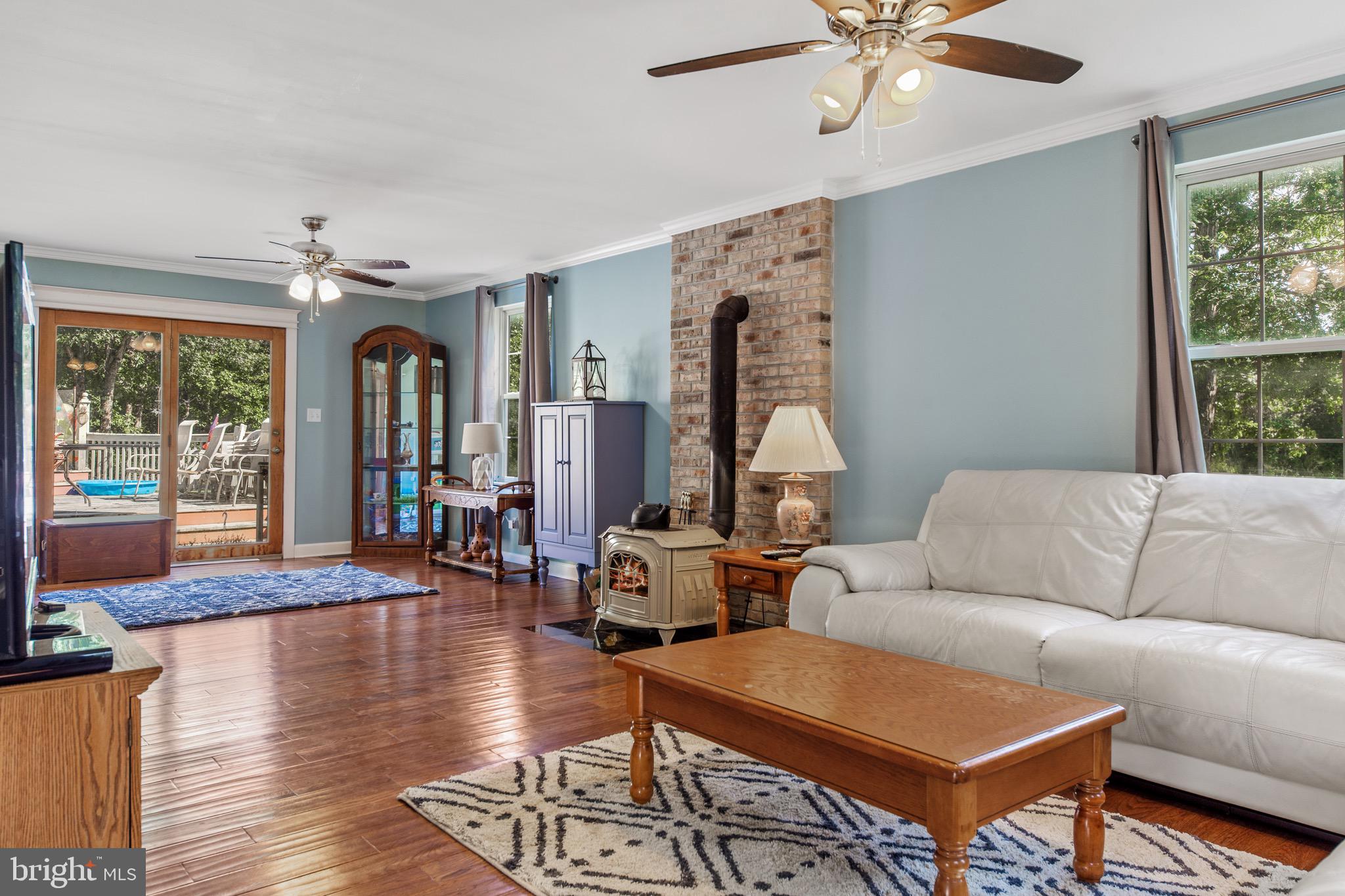 300 Ramah Road Bridgeton, NJ 08302 - Photo 5 of 41 a living room with fireplace furniture and a large window