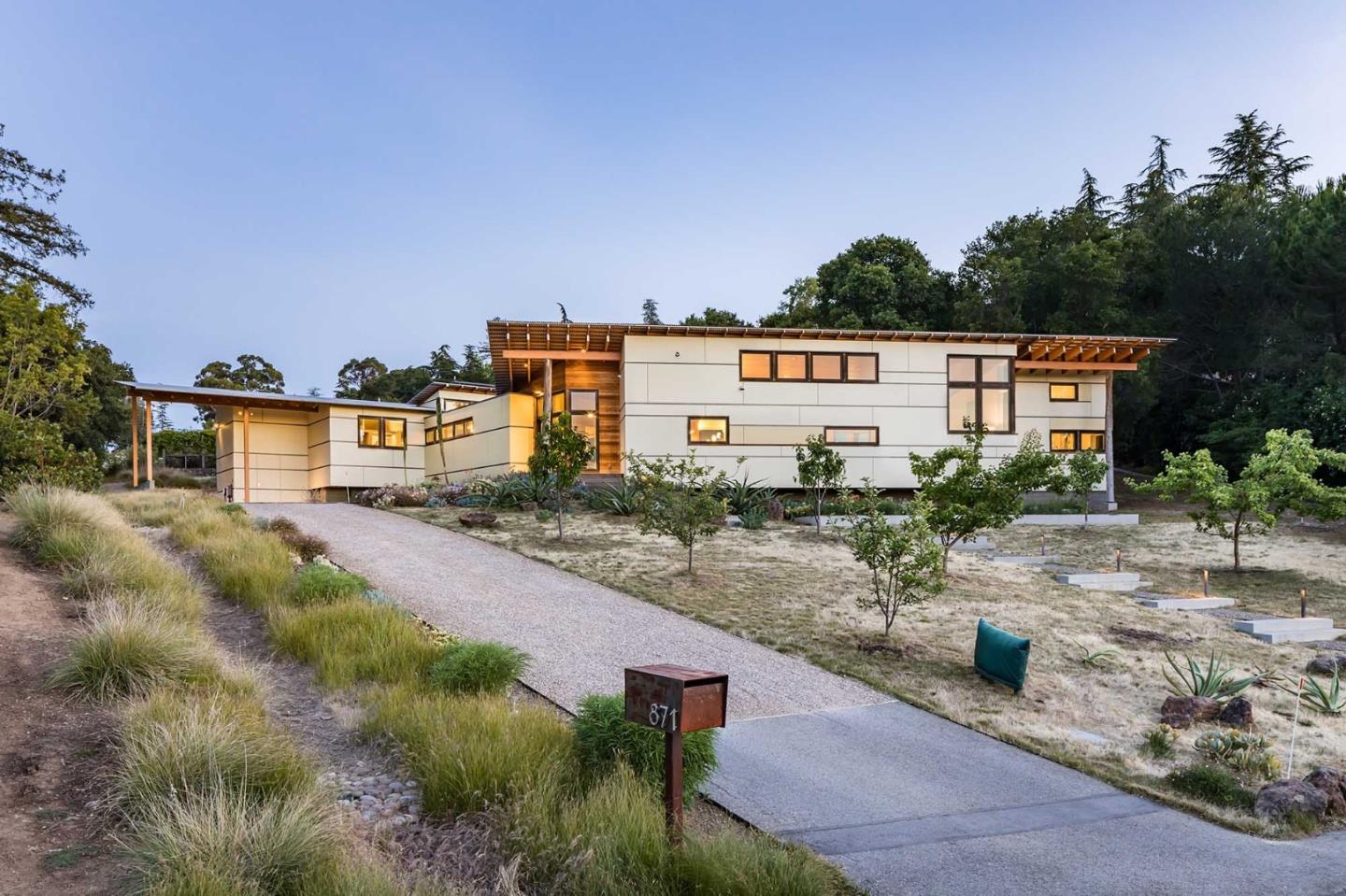 871 Robb Road Palo Alto, CA 94306 - Photo 2 of 35 a house with trees in front of it