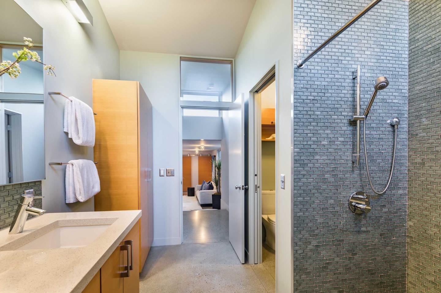 871 Robb Road Palo Alto, CA 94306 - Photo 23 of 35 a bathroom with a tub sink and mirror