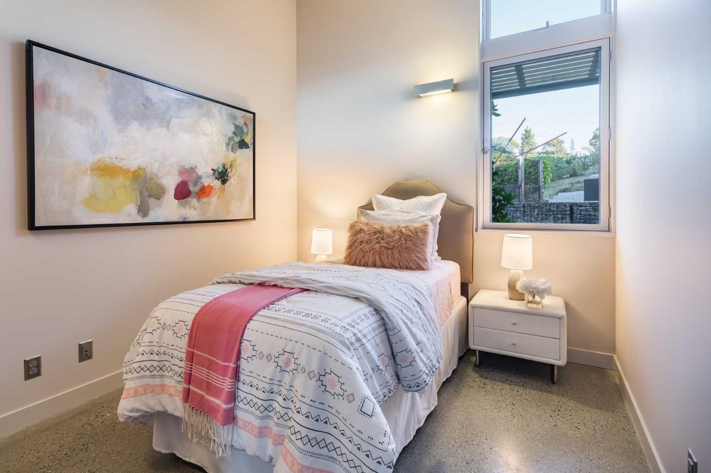 871 Robb Road Palo Alto, CA 94306 - Photo 24 of 35 a bedroom with a bed and a painting on the wall
