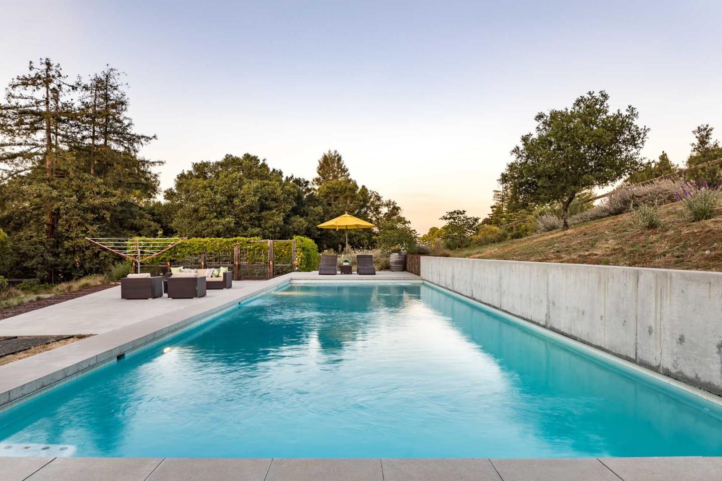 871 Robb Road Palo Alto, CA 94306 - Photo 33 of 35 a view of a swimming pool with a yard