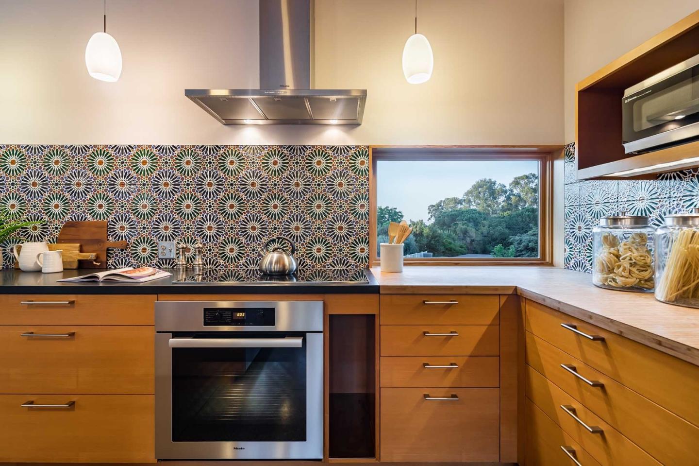 871 Robb Road Palo Alto, CA 94306 - Photo 8 of 35 a kitchen with a stove and a sink