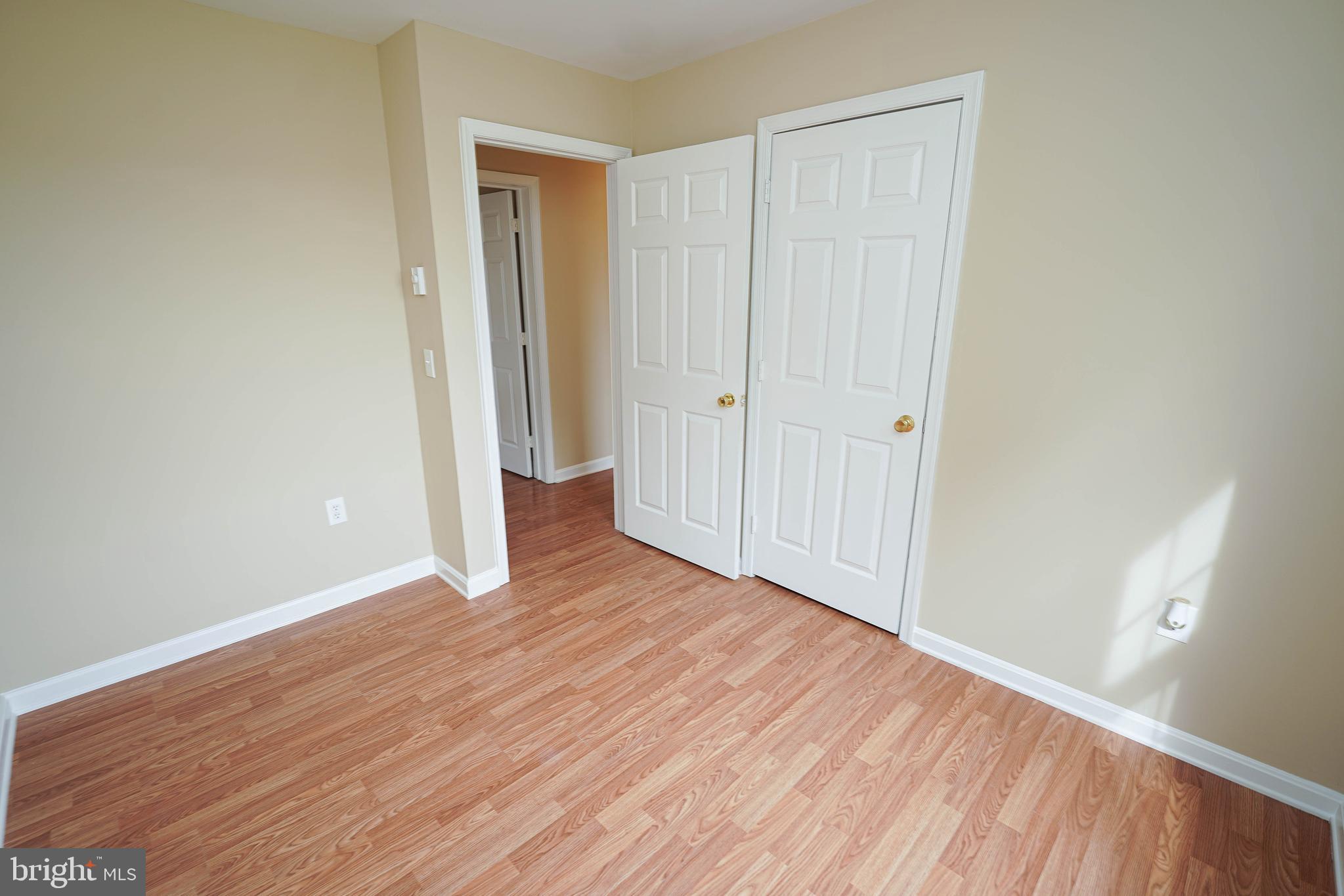 7526 Bethel Road Willards, MD 21874 - Photo 29 of 34 a view of an empty room with wooden floor