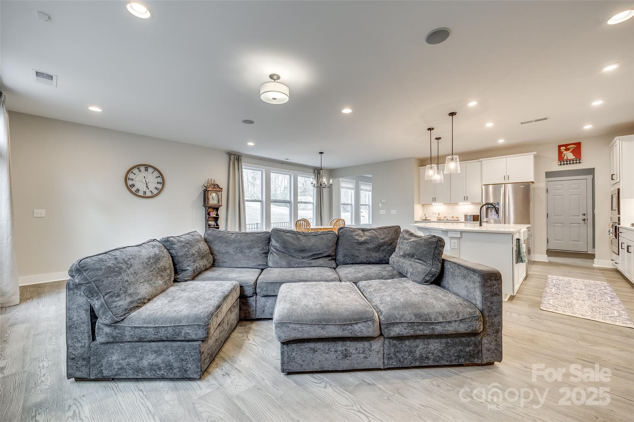 2024 Suttonview Road Fort Mill, SC 29708 - Photo 12 of 41 a living room with furniture and a view of kitchen