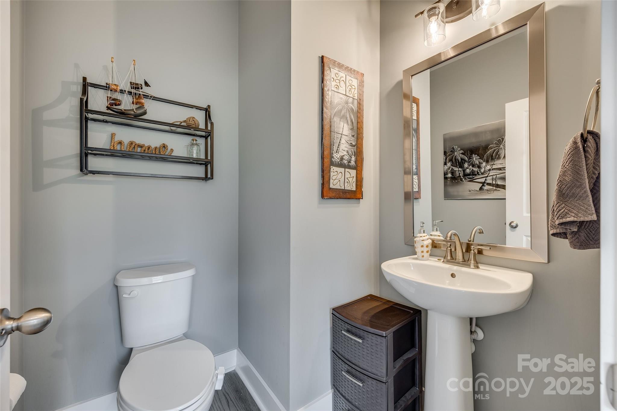 2024 Suttonview Road Fort Mill, SC 29708 - Photo 13 of 41 a bathroom with a sink toilet and a mirror