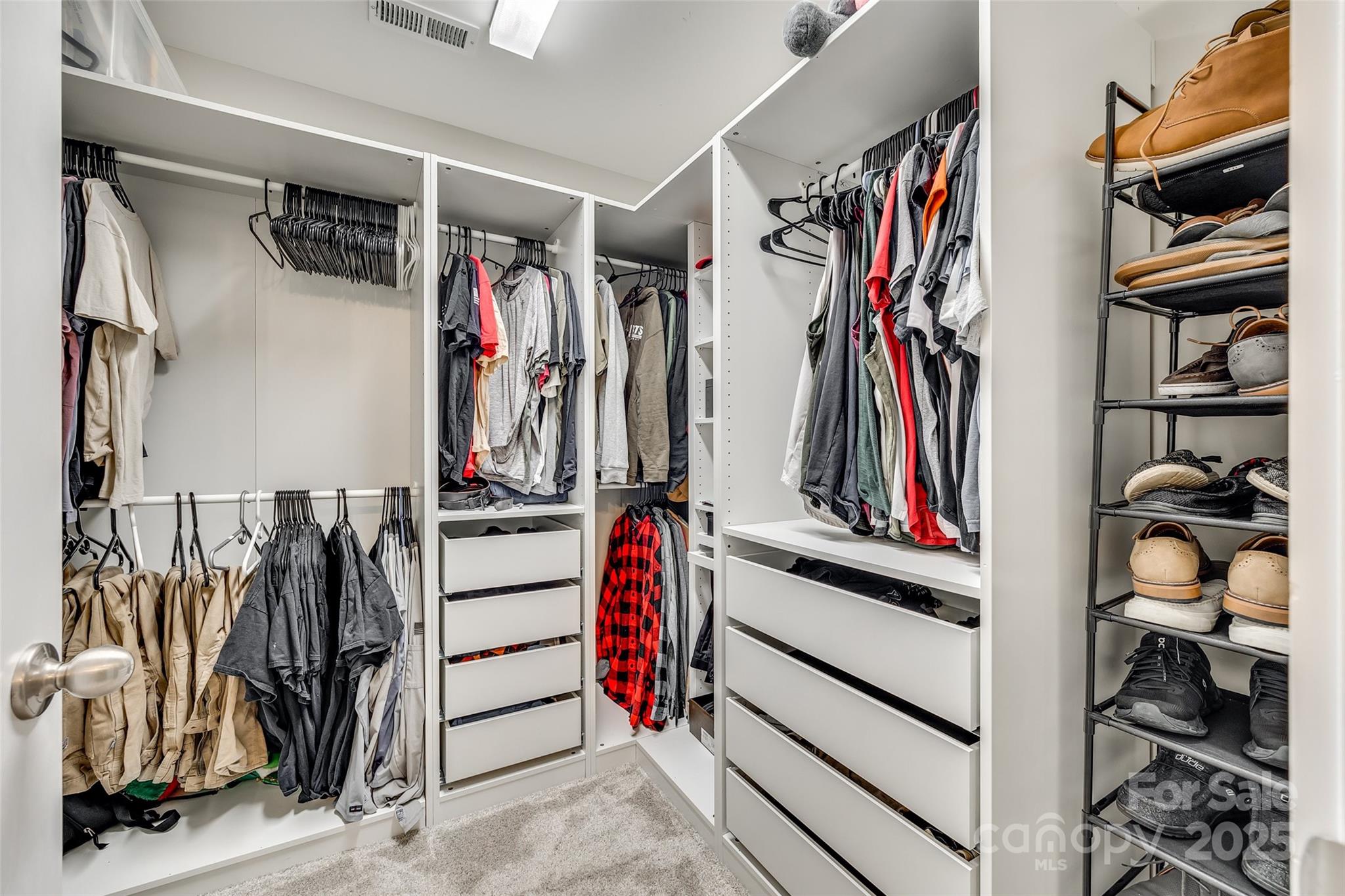2024 Suttonview Road Fort Mill, SC 29708 - Photo 20 of 41 a view of walk in closet with clothes and shoes