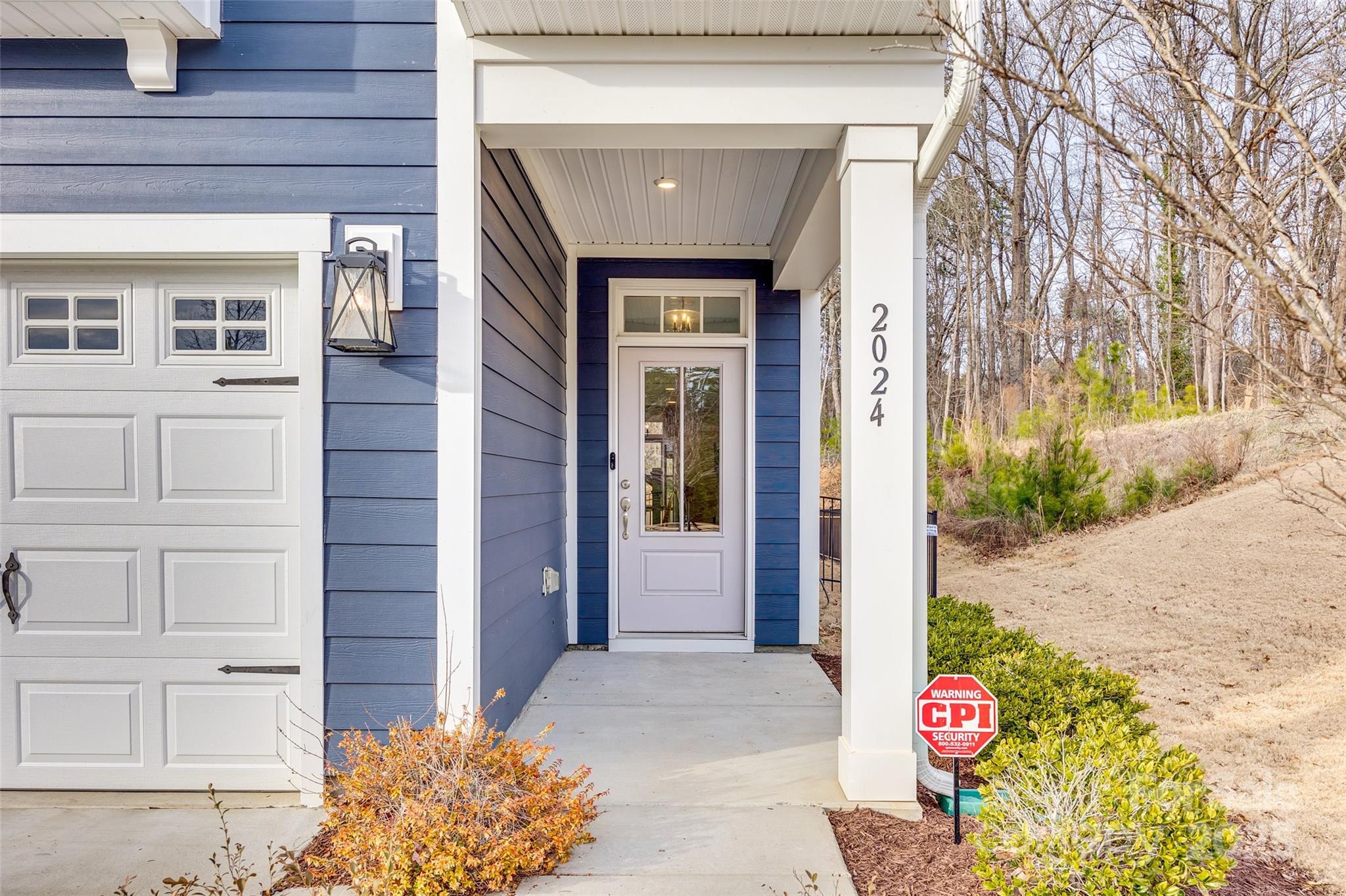2024 Suttonview Road Fort Mill, SC 29708 - Photo 2 of 41 a front view of a house with garden