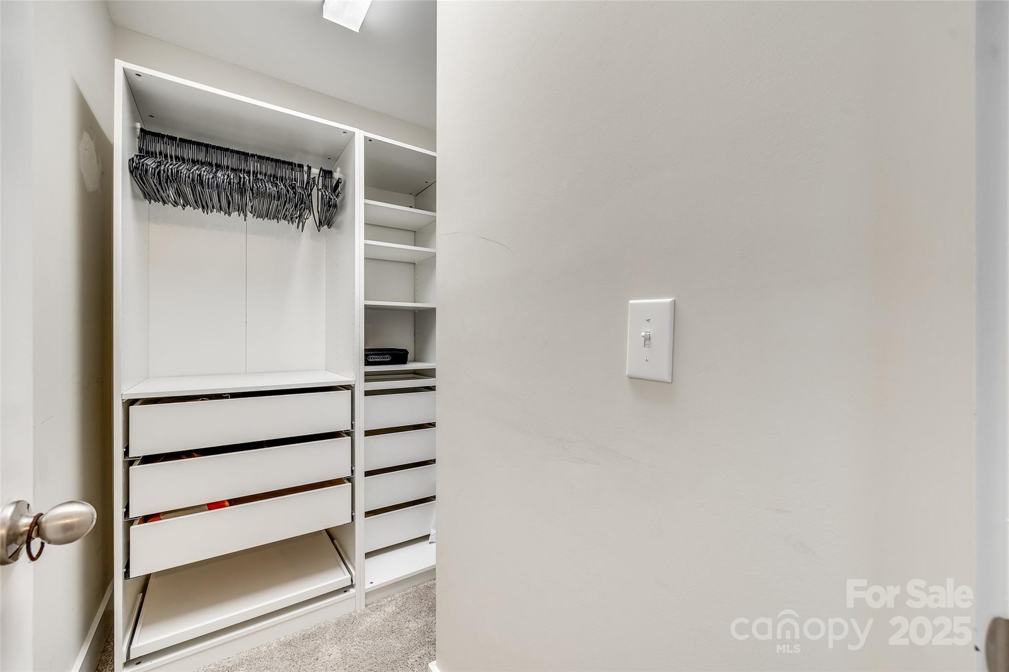 2024 Suttonview Road Fort Mill, SC 29708 - Photo 21 of 41 a view of walk in closet with empty racks