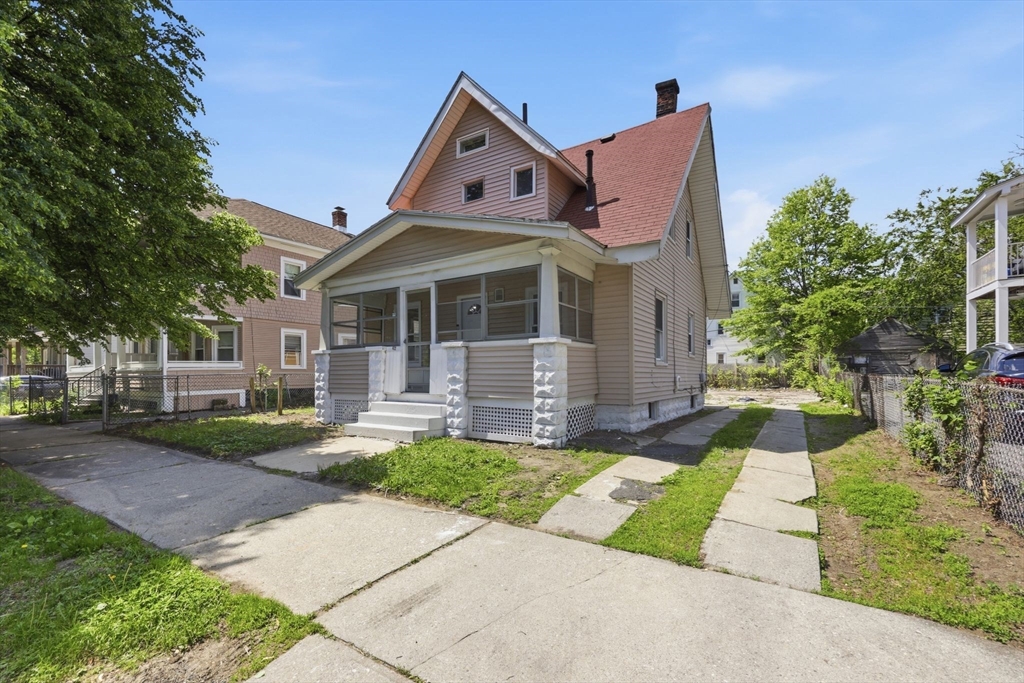 62 Kenyon Street Springfield, MA 01109 - Photo 2 of 26 a front view of house with yard and green space