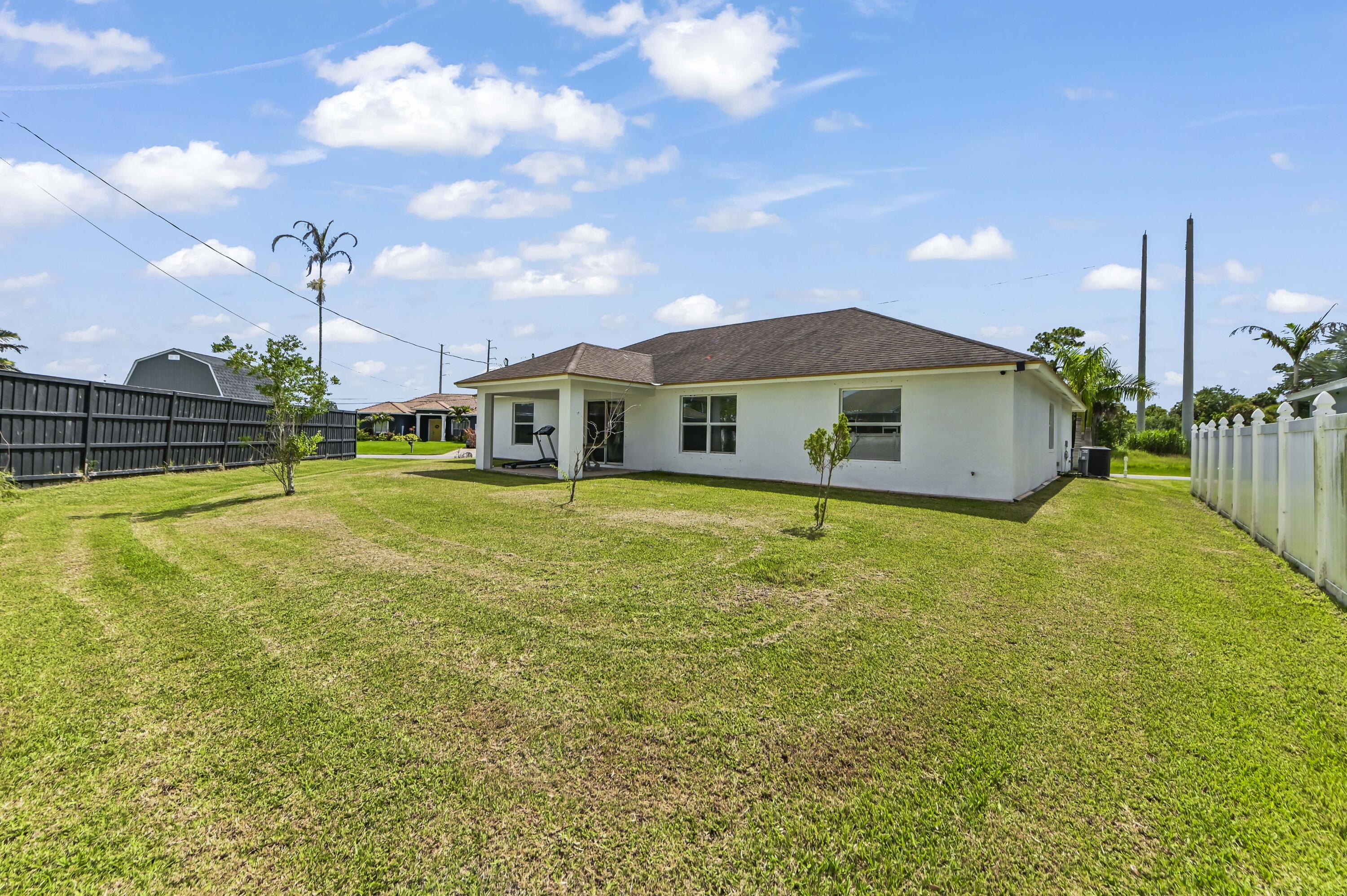 2194 Southwest Salmon Road Port St. Lucie, FL 34953 - Photo 23 of 29 31 Backyard 02