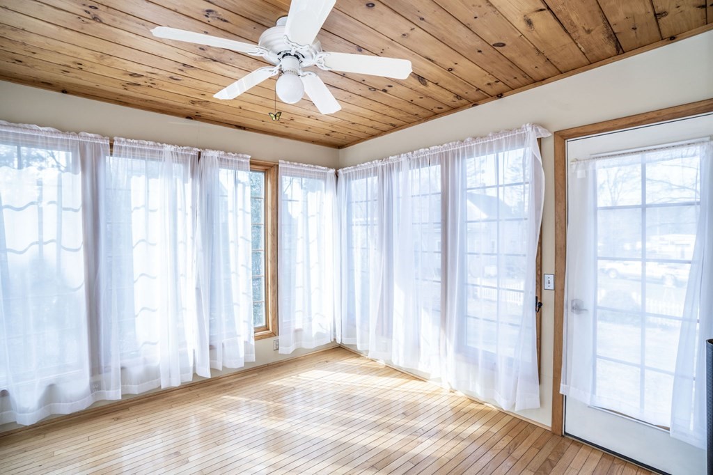 56 Spring Street Plainville, MA 02762 - Photo 11 of 21 a view of an empty room with a window