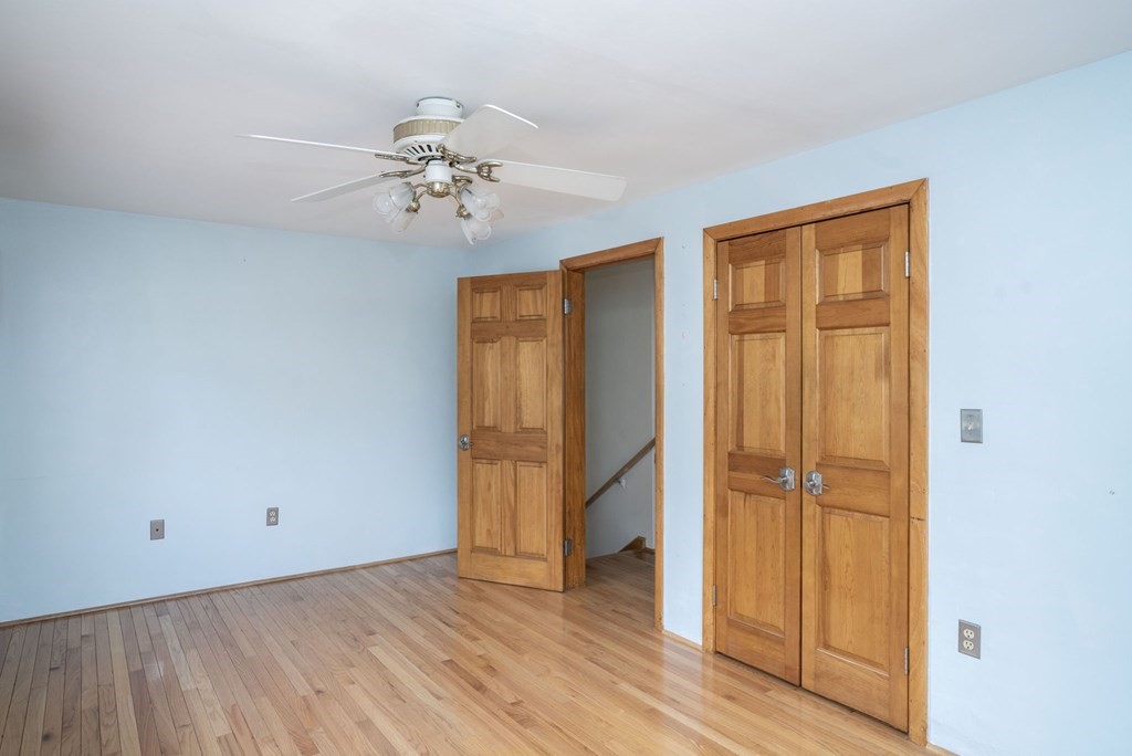 56 Spring Street Plainville, MA 02762 - Photo 14 of 21 wooden floor in an empty room with a window