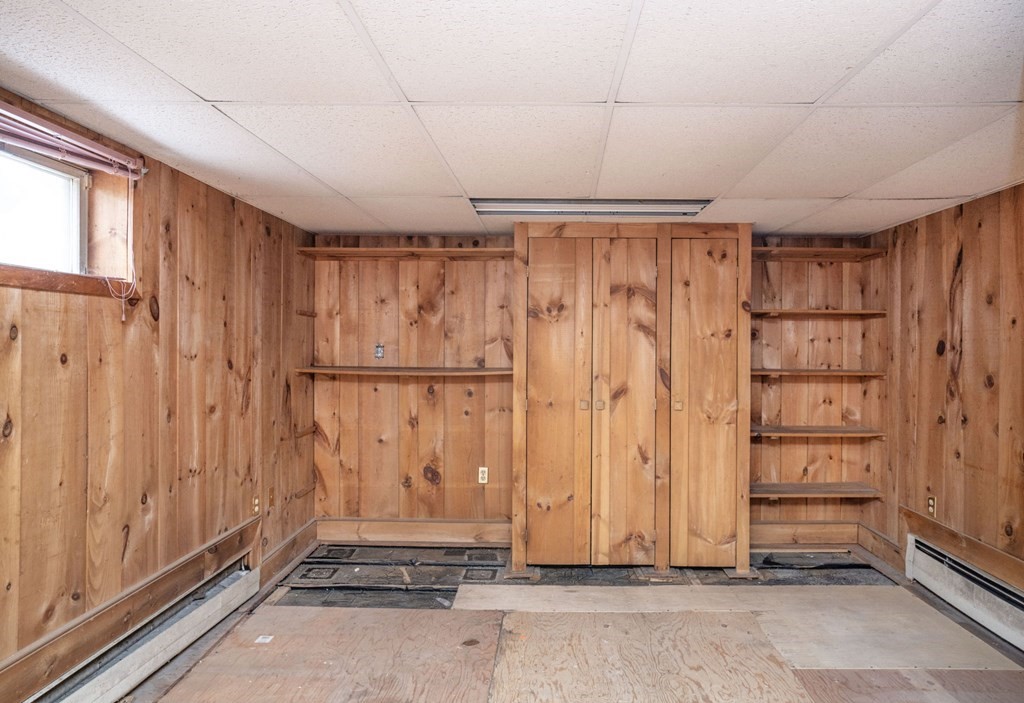 56 Spring Street Plainville, MA 02762 - Photo 20 of 21 a view of a room with wooden walls