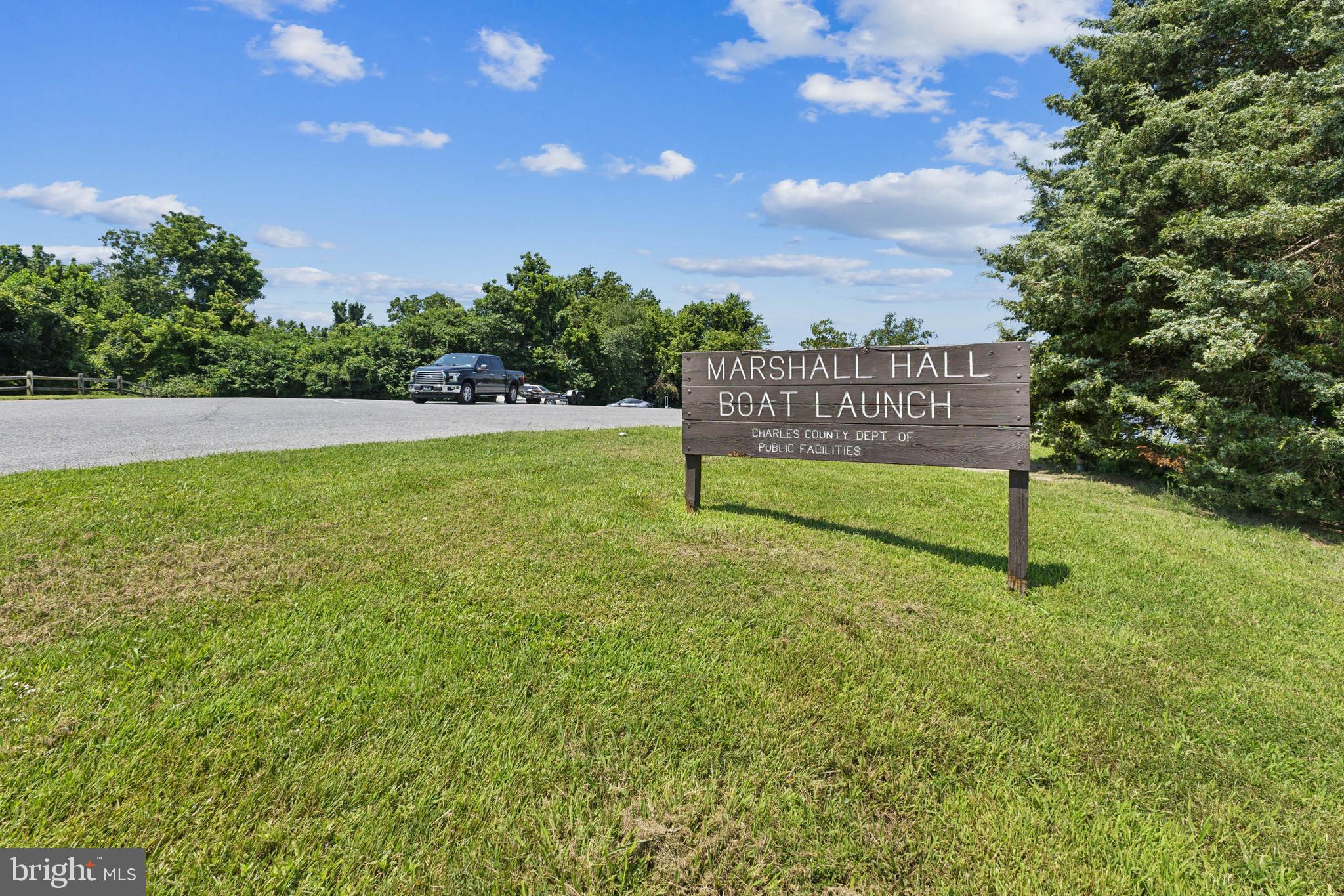 6005 Fenwick Road Bryans Road, MD 20616 - Photo 5 of 9 a view of a park with a sign board