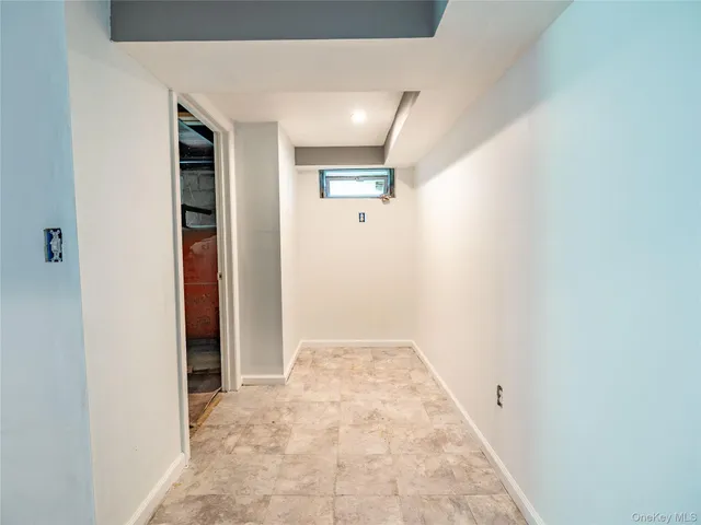 a view of a storage room with racks on the wall