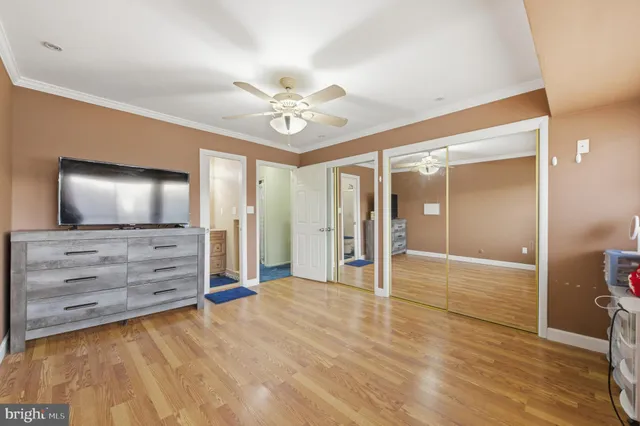 a view of an empty room and window fire place