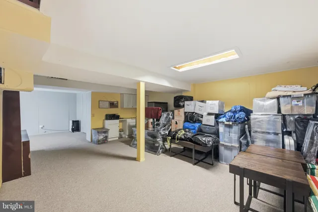 a view of a livingroom with furniture and a couch