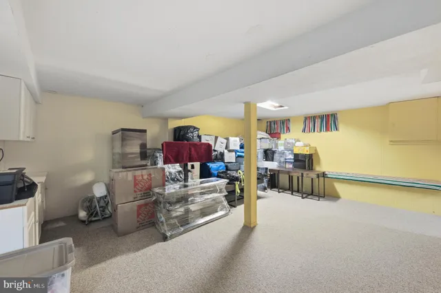 a view of a livingroom with furniture and a couch