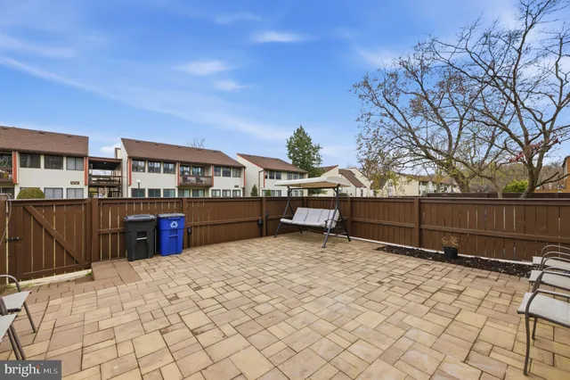 a backyard of a house with seating space
