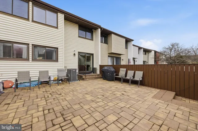 a backyard of a house with seating space