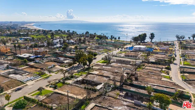 a view of balcony with wooden floor and seating space